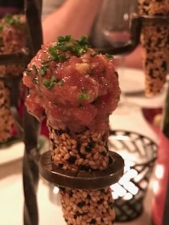 Toma Restaurant and Bar signature dishes Ahi Tuna ConesLasagnaGrilled Spanish Octopus